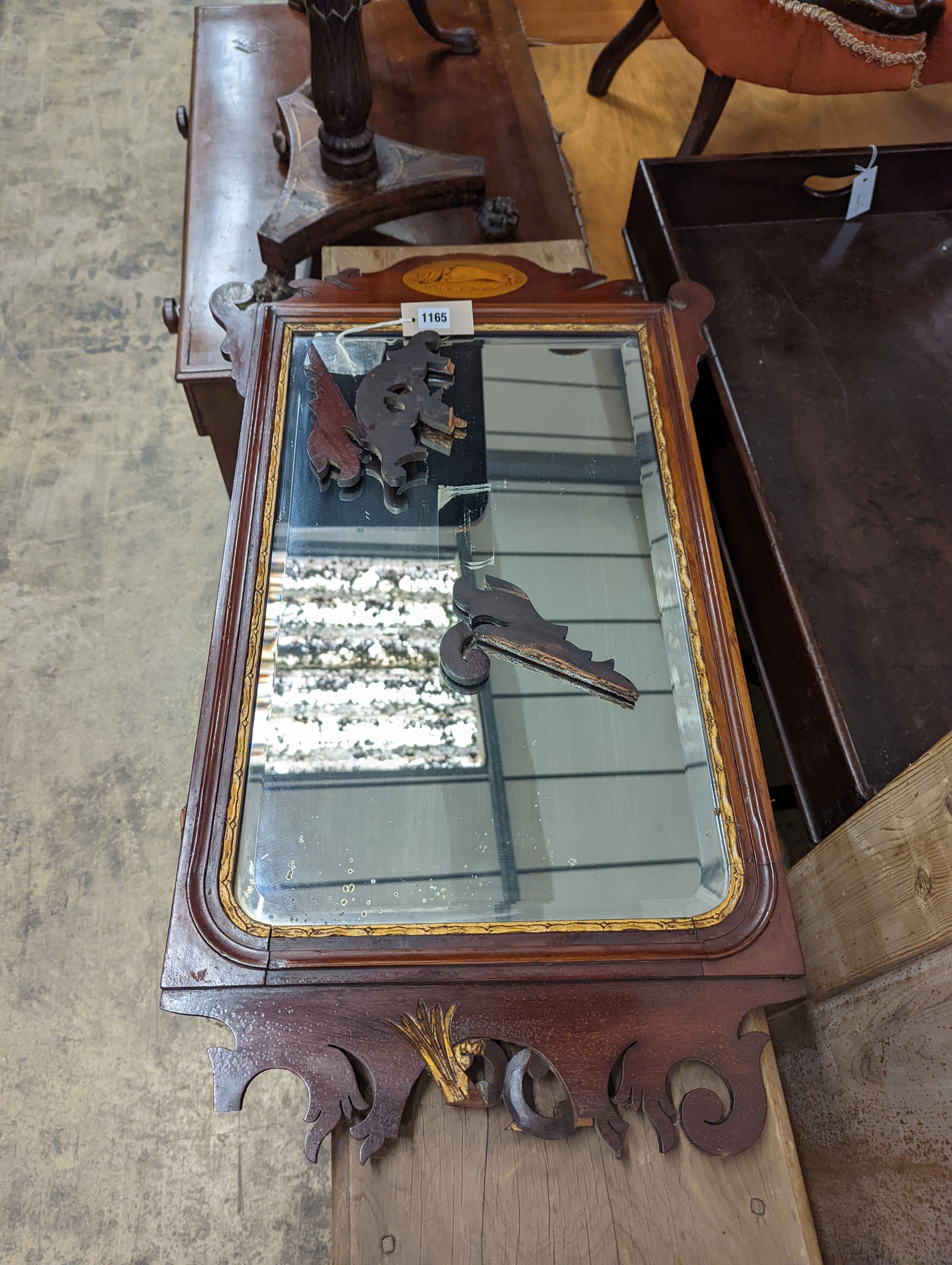 A George III style mahogany fret cut wall mirror in need of restoration, width 52cm, height 83cm